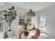 Well-lit office area showcasing a unique desk design, a comfortable chair, and a view to the outside at 124 Beresford Creek St, Charleston, SC 29492