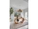 Well-lit office area showcasing a unique desk design, a comfortable chair, and a view to the outside at 124 Beresford Creek St, Charleston, SC 29492