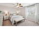 Bright bedroom features ceiling fan, and large window with natural light at 1327 Bob White Dr, Charleston, SC 29412