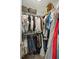 Walk-in closet featuring ample storage with hanging rods and shelves, plus decorative wicker baskets for organization at 1327 Bob White Dr, Charleston, SC 29412