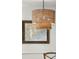Stylish dining room pendant light fixture with interesting textural details at 1327 Bob White Dr, Charleston, SC 29412