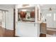 Open concept kitchen with dark wood cabinets, stainless steel appliances, and a breakfast bar at 1327 Bob White Dr, Charleston, SC 29412