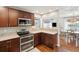 Updated kitchen features stainless steel appliances, granite countertops, and ample cabinet space at 1327 Bob White Dr, Charleston, SC 29412