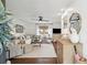 Bright living room with ample seating, hardwood floors, a ceiling fan, and lots of natural light at 1327 Bob White Dr, Charleston, SC 29412
