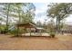 Outdoor pergola with wooden deck and cozy seating area, creating an inviting entertainment space at 1327 Bob White Dr, Charleston, SC 29412