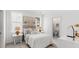 This charming bedroom features shiplap walls and serene decor, creating a calming retreat at 1441 Clay Field Trl, Summerville, SC 29485
