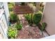 Aerial view of backyard with brick pavers, privacy landscaping, and pergola at 157 Tradd St, Charleston, SC 29401