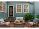 Cozy backyard with outdoor seating, perfect for entertaining or relaxing at 157 Tradd St, Charleston, SC 29401