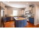 Modern kitchen with custom cabinets, granite countertops, and stainless steel appliances at 157 Tradd St, Charleston, SC 29401