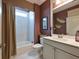 Modern bathroom with marble counters, bathtub and designer fixtures at 170 Collared Dove Ct, Summerville, SC 29483