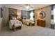 Inviting bedroom with two beds, fan, and decor in a neutral color palette at 170 Collared Dove Ct, Summerville, SC 29483
