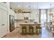 A gourmet kitchen boasts a large island, stainless appliances, and custom cabinetry at 170 Collared Dove Ct, Summerville, SC 29483
