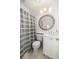 Bathroom with shower, tub and ornate gold mirror at 19 Grand Pavilion Blvd, Isle of Palms, SC 29451