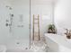 Bright bathroom features glass shower, tub and modern fixtures at 19 Grand Pavilion Blvd, Isle of Palms, SC 29451