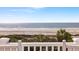 Enjoy beautiful beach views from the porch of this property with palm trees and ocean views at 19 Grand Pavilion Blvd, Isle of Palms, SC 29451