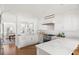 Beautiful kitchen featuring custom cabinets, marble countertops, stainless steel appliances, and hardwood floors at 19 Grand Pavilion Blvd, Isle of Palms, SC 29451