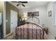Comfortable bedroom features wood plank walls, a plush bed, ample natural light, and stylish decor at 2101 Guerins Bridge Rd, Wando, SC 29492