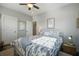 Cozy bedroom with natural light, a comfortable bed, and stylish accents for a relaxing retreat at 2101 Guerins Bridge Rd, Wando, SC 29492