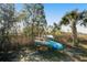 Storage of two kayaks located near the shore amongst some trees and a palm tree at 2101 Guerins Bridge Rd, Wando, SC 29492