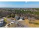Expansive aerial view of home with attached garage, lush trees and established lawns at 2101 Heavens Way, Summerville, SC 29483
