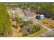 Aerial view featuring houses nestled between mature trees in a residential area at 2101 Heavens Way, Summerville, SC 29483