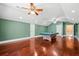 Open game room featuring a pool table, ceiling fans, and ample space for entertaining and games at 2101 Heavens Way, Summerville, SC 29483