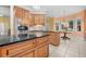 Spacious kitchen features granite countertops, stainless steel appliances, and center island with breakfast nook at 2101 Heavens Way, Summerville, SC 29483