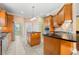 Large kitchen with granite countertops, stainless steel appliances and eat in island at 2101 Heavens Way, Summerville, SC 29483