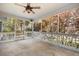 Inviting screened porch with views of the wooded backyard area at 2101 Heavens Way, Summerville, SC 29483