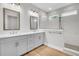 Bathroom featuring double vanity, quartz counters, and glass enclosed shower at 2210 Norwood Oaks Dr, Mount Pleasant, SC 29466