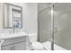 Modern bathroom featuring a vanity with a sleek sink and a glass-enclosed shower with tile surround at 2210 Norwood Oaks Dr, Mount Pleasant, SC 29466