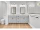 Bright bathroom featuring double vanity, quartz counters, and glass enclosed shower at 2210 Norwood Oaks Dr, Mount Pleasant, SC 29466