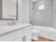 Bathroom with gray subway tile, modern fixtures, and white vanity at 2210 Norwood Oaks Dr, Mount Pleasant, SC 29466