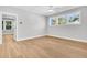 Bright bedroom with hardwood flooring and a view through the window at 2210 Norwood Oaks Dr, Mount Pleasant, SC 29466