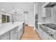 Bright kitchen featuring an island, stainless steel appliances, and modern light gray cabinetry at 2210 Norwood Oaks Dr, Mount Pleasant, SC 29466