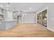 Bright living room with wood floors and large sliding glass doors offering an open view to the outside at 2210 Norwood Oaks Dr, Mount Pleasant, SC 29466