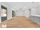 Open-concept living room with sliding glass doors providing natural light and access to the backyard at 2210 Norwood Oaks Dr, Mount Pleasant, SC 29466