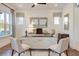 Well-lit home office features shiplap walls, modern decor, and hardwood floors at 2210 Norwood Oaks Dr, Mount Pleasant, SC 29466