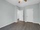 Clean bedroom with wood floors, ceiling fan, and natural light at 2212 Telfair Way, Charleston, SC 29412