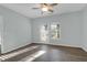 Bright bedroom featuring a sliding glass door and window with wood-look floors at 2212 Telfair Way, Charleston, SC 29412