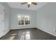 Bedroom with hard wood floors and natural light at 2212 Telfair Way, Charleston, SC 29412