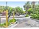 Gated community entrance with lush greenery and security features, ensuring privacy at 2212 Telfair Way, Charleston, SC 29412