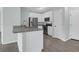 Modern kitchen with white cabinets, stainless steel appliances, and granite countertops at 2212 Telfair Way, Charleston, SC 29412