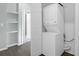 Laundry room featuring a washer and dryer stacked on top of one another at 2212 Telfair Way, Charleston, SC 29412