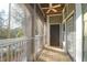 Relaxing screened porch with a ceiling fan and a view of the surrounding landscape at 2212 Telfair Way, Charleston, SC 29412