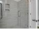 Bathroom with a glass door shower and shower storage at 2212 Telfair Way, Charleston, SC 29412