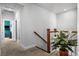 Upstairs hallway with a plant and view into the gym at 242 Bering Ln, Summerville, SC 29486