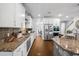 Modern kitchen with stainless steel appliances, a spacious island, and granite countertops at 242 Bering Ln, Summerville, SC 29486
