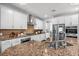 Modern kitchen with stainless steel appliances, granite countertops, and stylish backsplash at 242 Bering Ln, Summerville, SC 29486