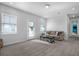 Bright and airy living room with neutral colors and plenty of natural light at 242 Bering Ln, Summerville, SC 29486